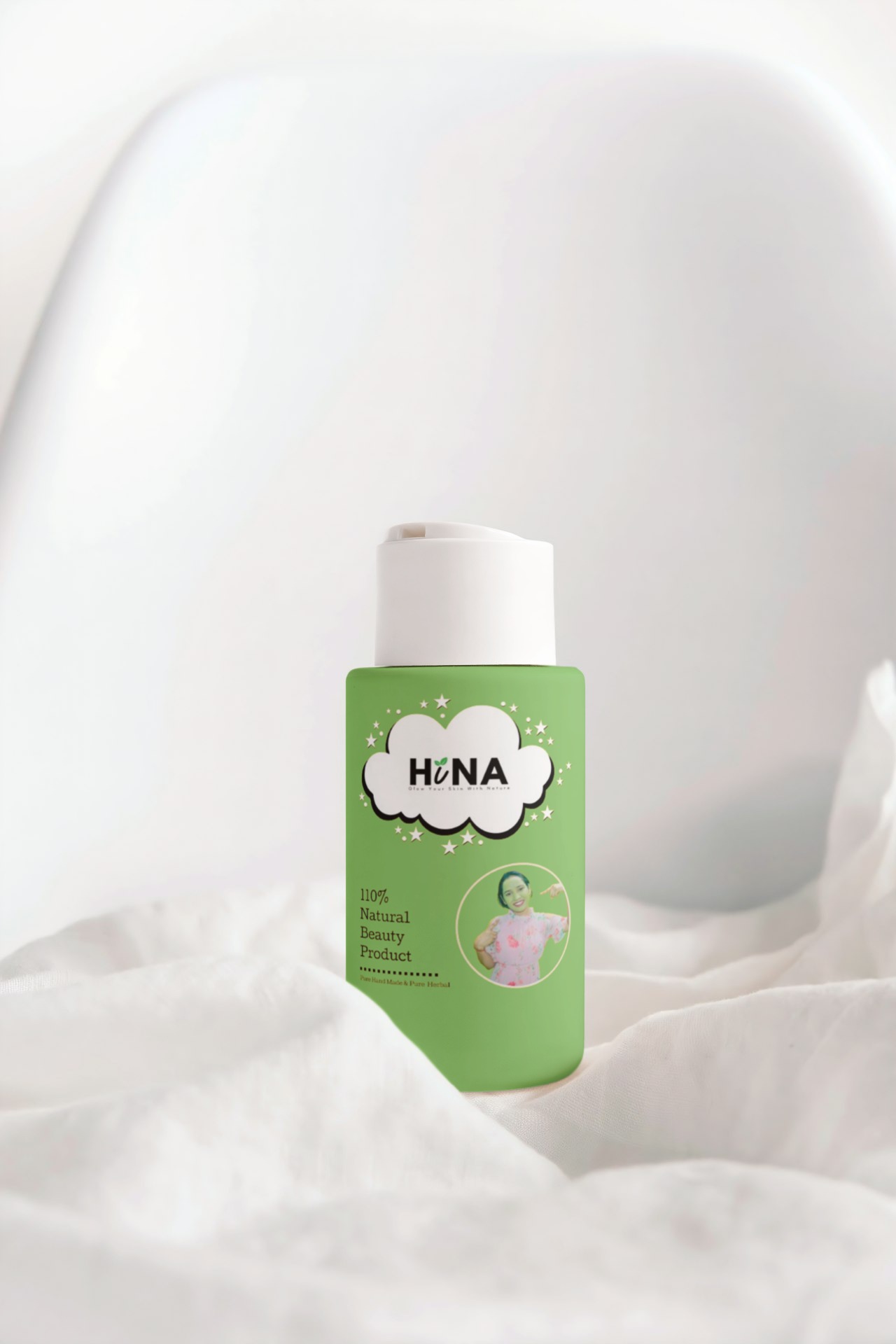 Tall slender porcelain bottle with natural clay textured body and cork stopper.